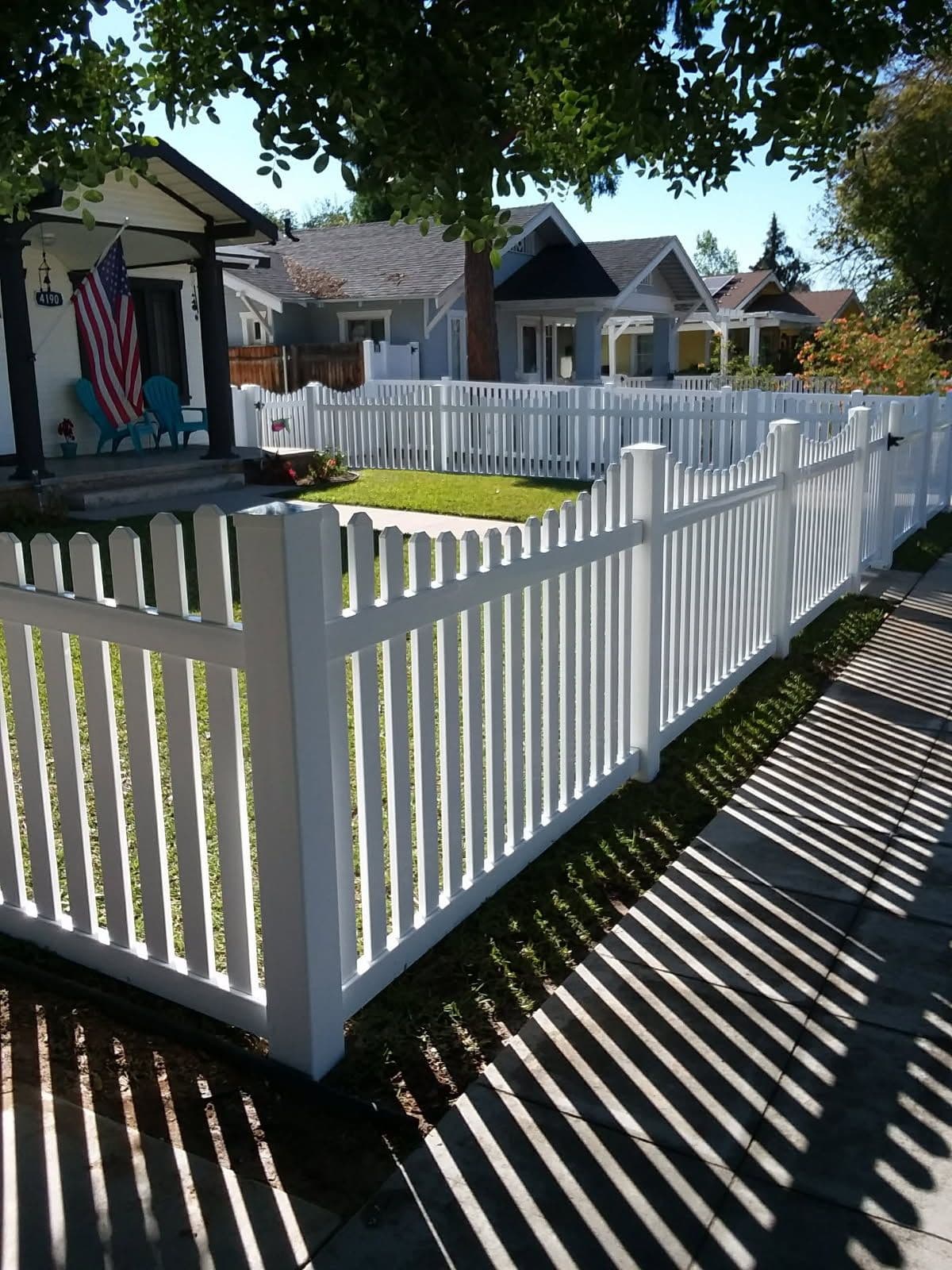 Classic Scallop Fence Enhances Curb Appeal